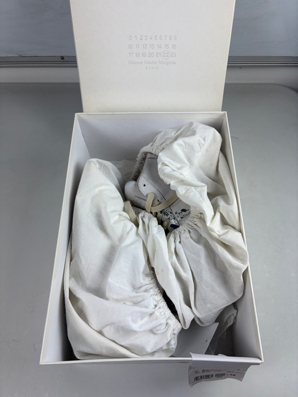 Maison Margiela ‘Paint-splatter’ high tops - eu 40 / us 7 - white