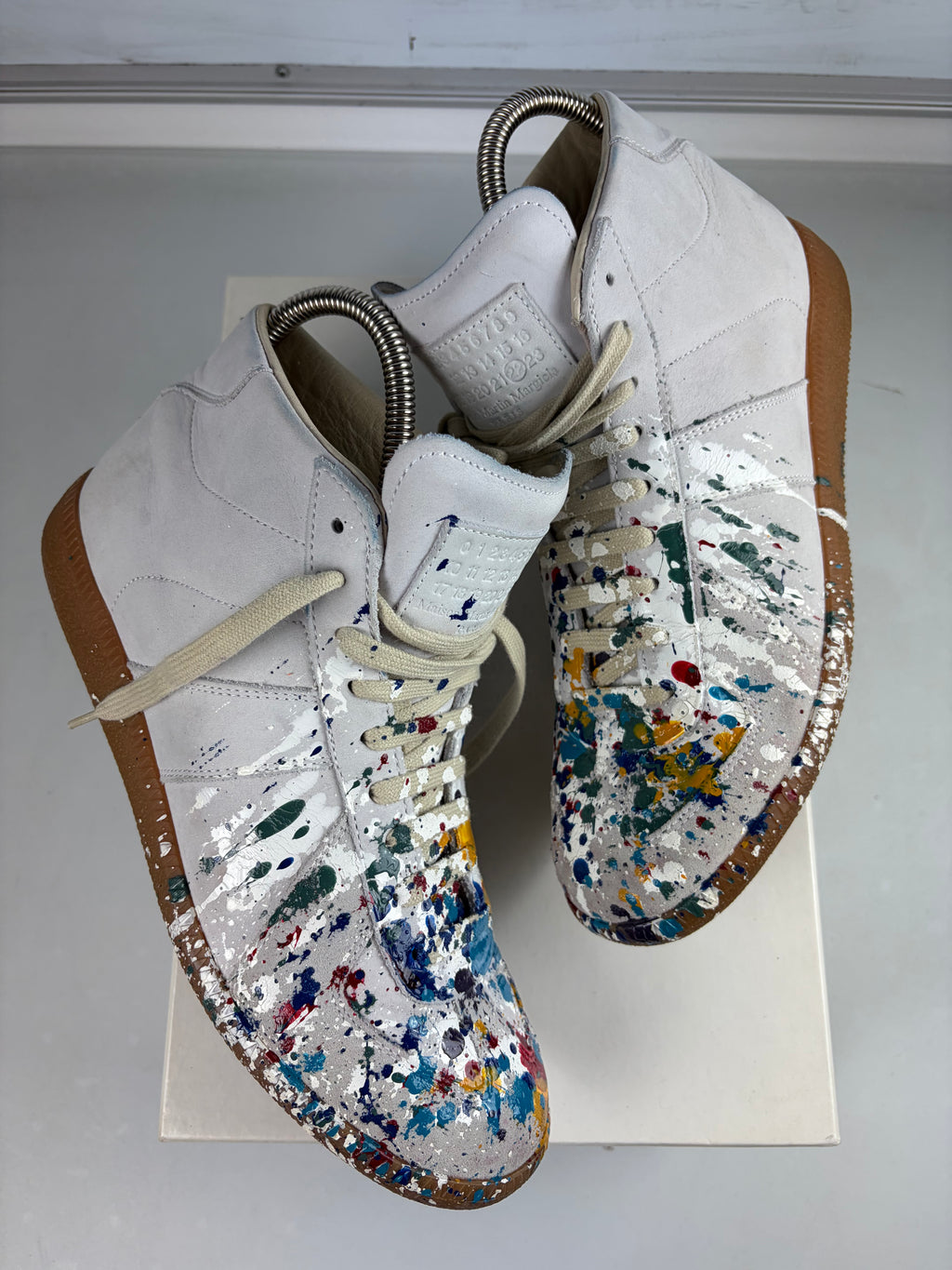 Maison Margiela ‘Paint-splatter’ high tops - eu 40 / us 7 - white