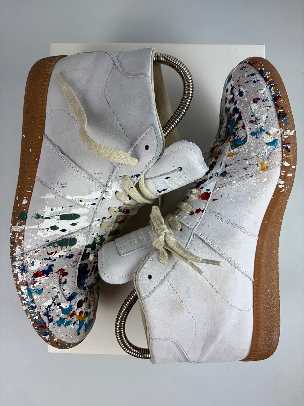Maison Margiela ‘Paint-splatter’ high tops - eu 40 / us 7 - white