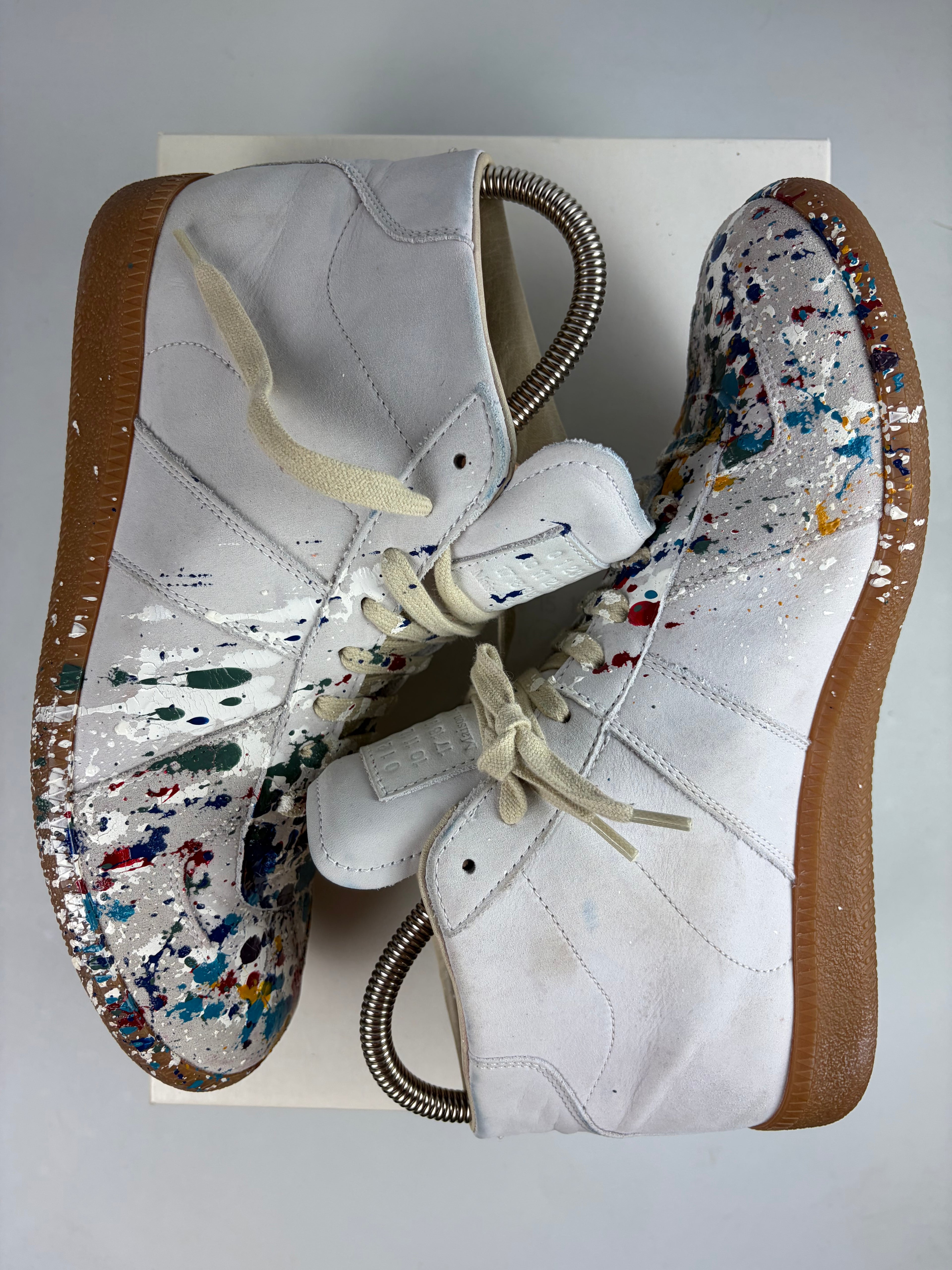 Maison Margiela ‘Paint-splatter’ high tops - eu 40 / us 7 - white