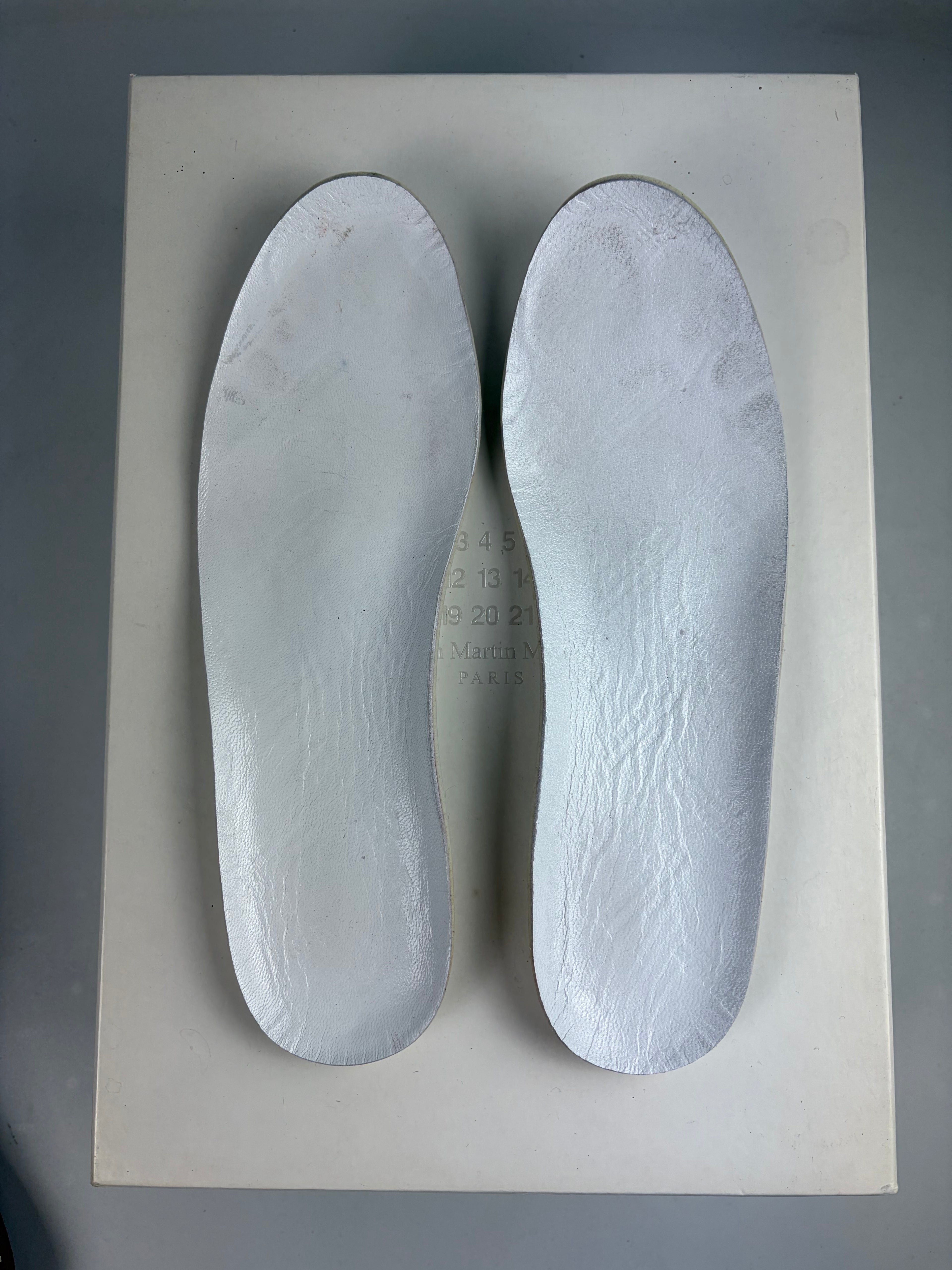 Maison Margiela ‘Paint-splatter’ high tops - eu 40 / us 7 - white